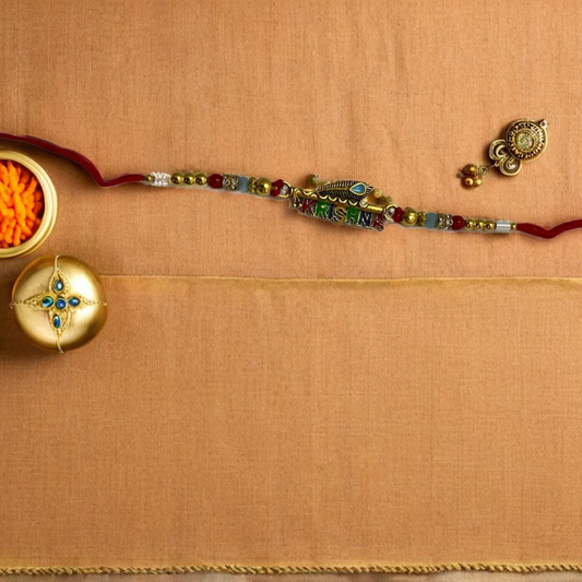 Divine Krishna Rakhi – Peacock Feather Edition